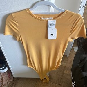 Yellow bodysuit
